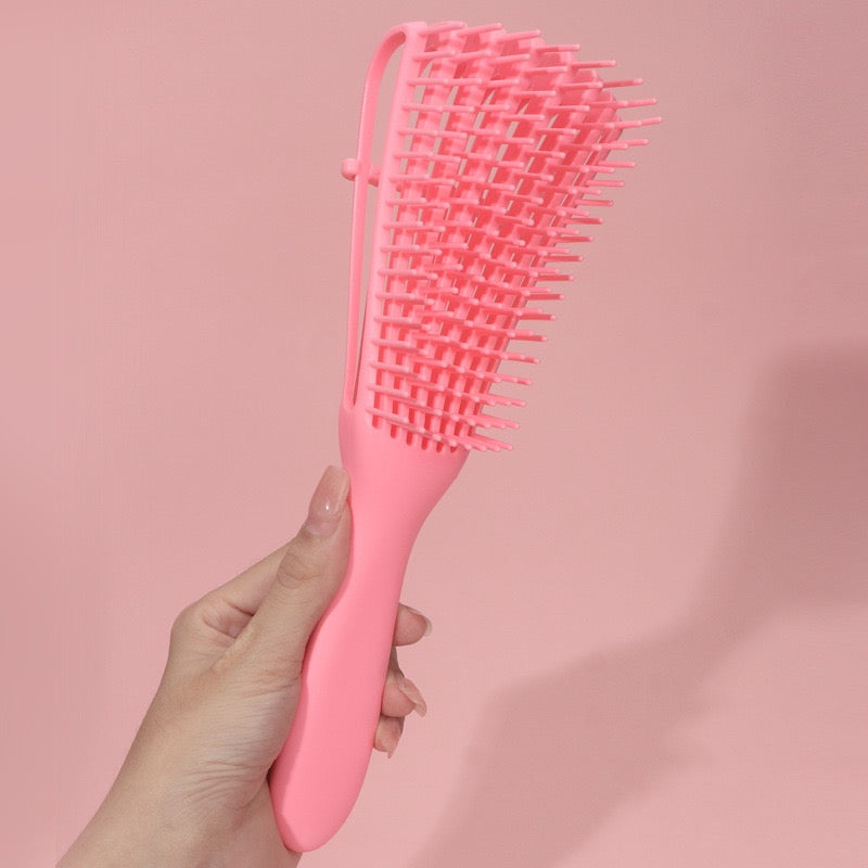Cepillo flexible desenredante