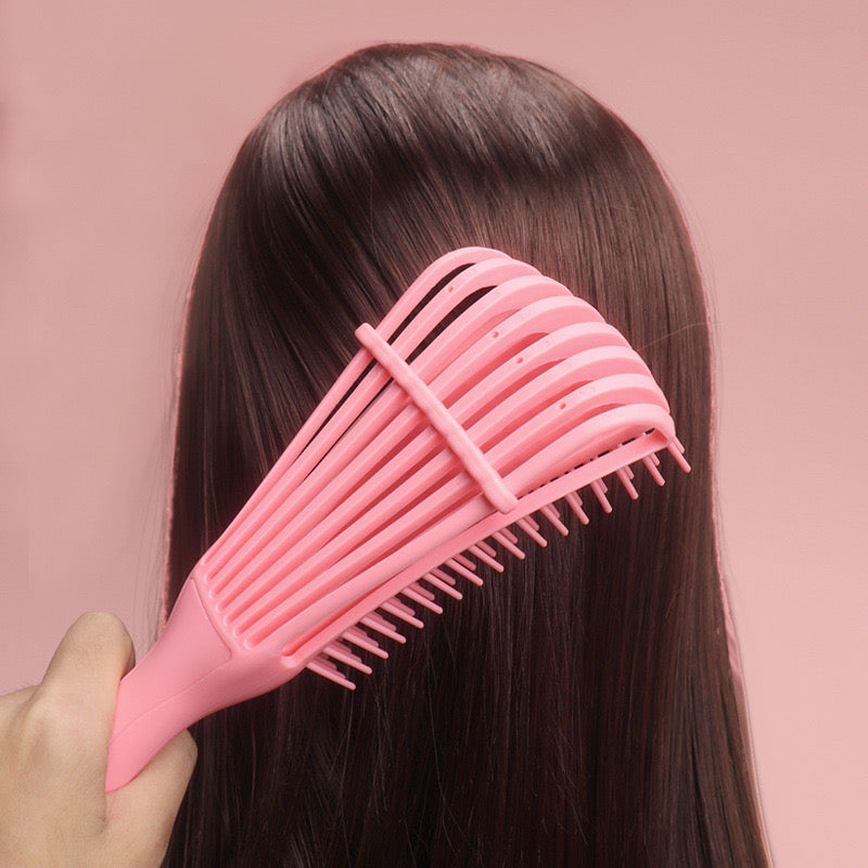 Cepillo flexible desenredante